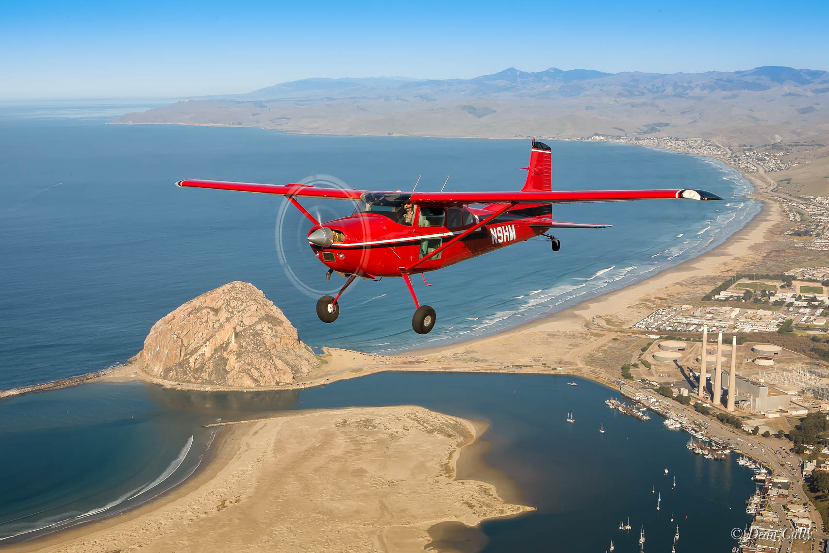 Cessna 185 Nestled in the Coastline